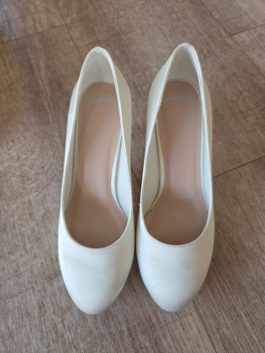Pumps i satin