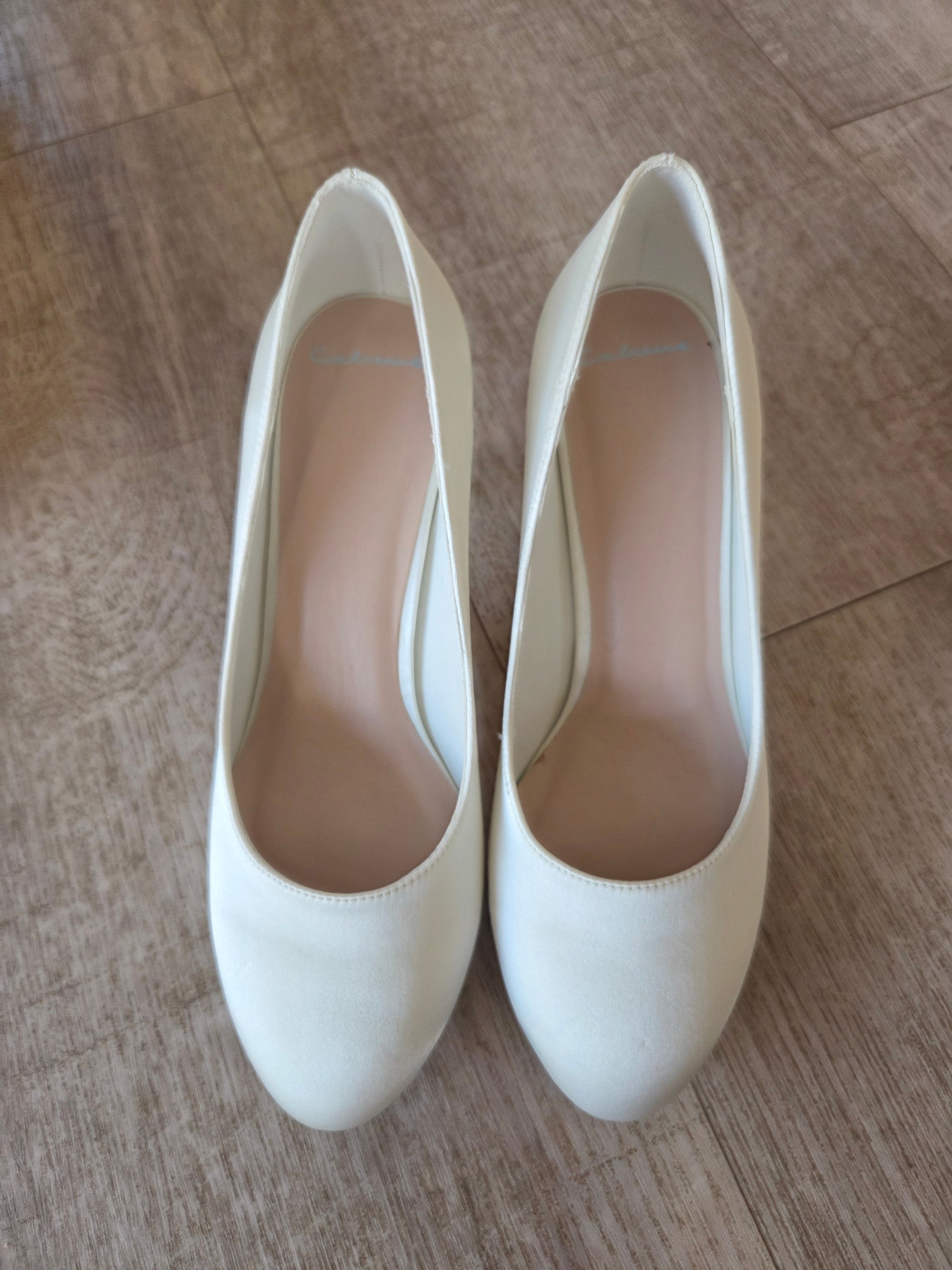 Pumps i satin