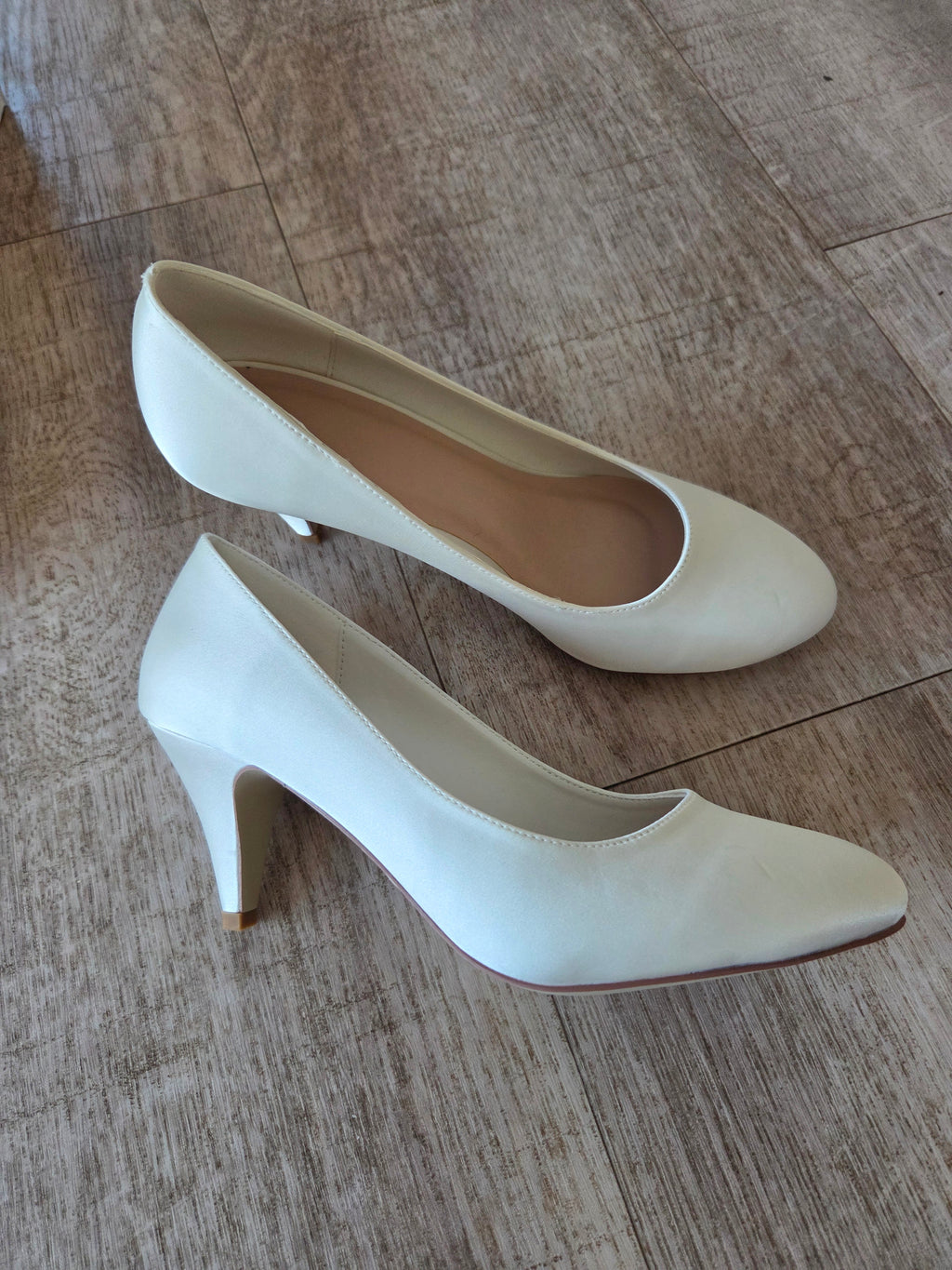 Pumps i satin